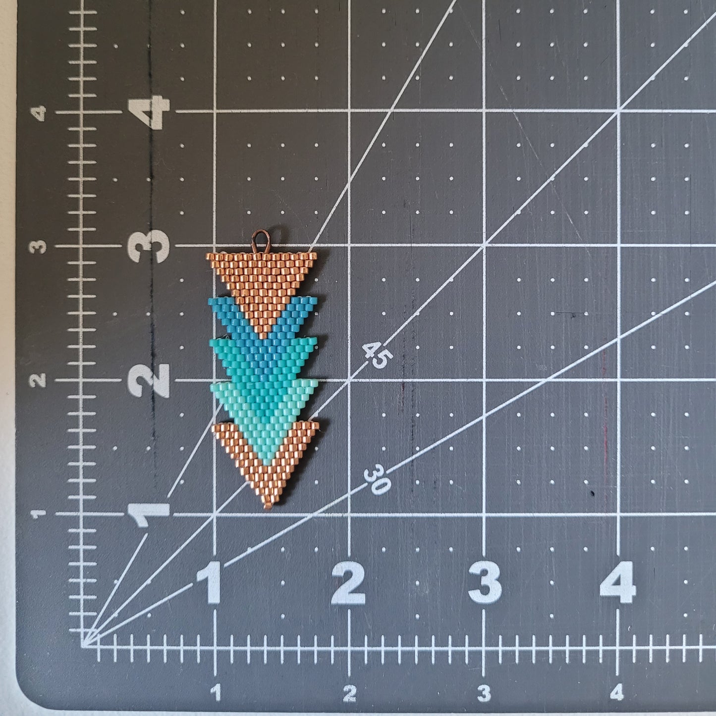 Turquoise and copper arrow beaded earrings