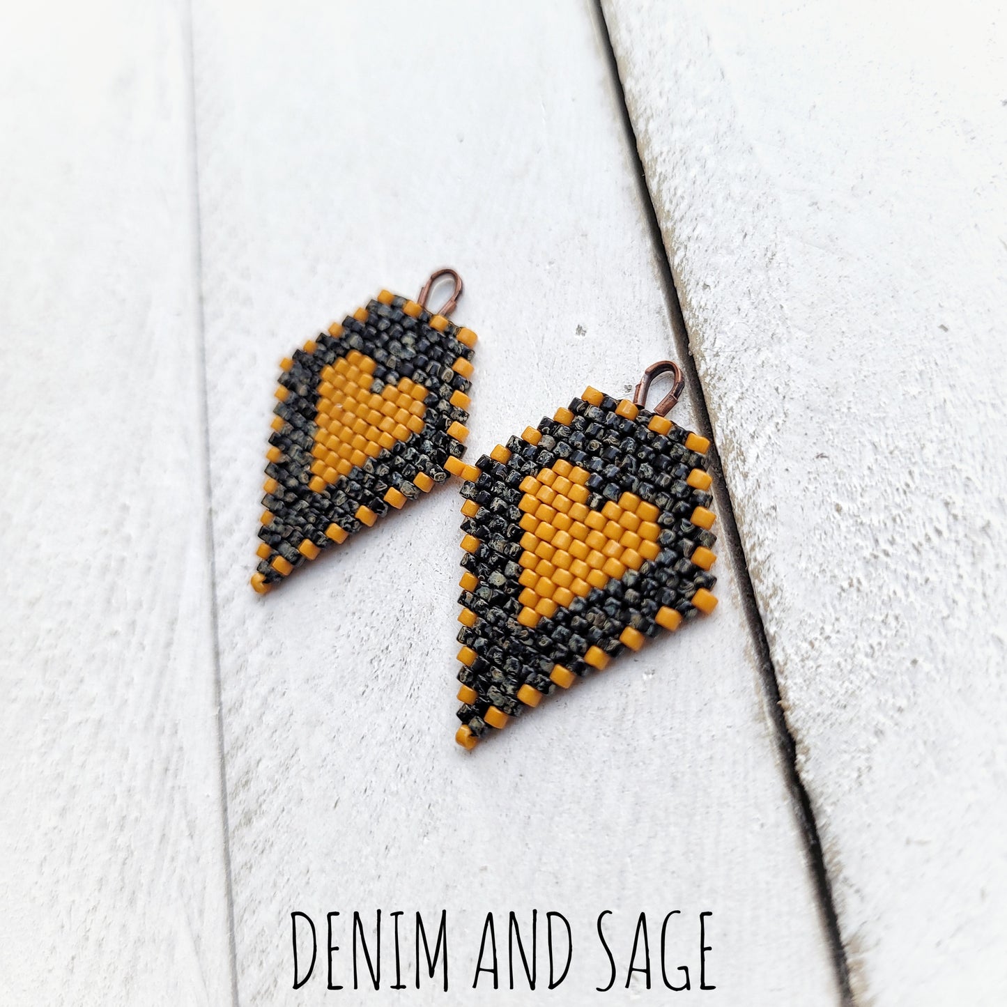 Black picasso and hawthorne heart beaded earrings