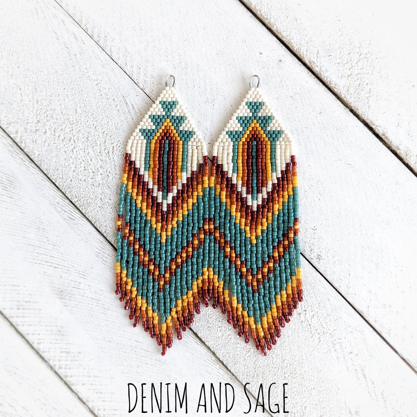 Dark red, burnt orange, yellow and green beaded earrings